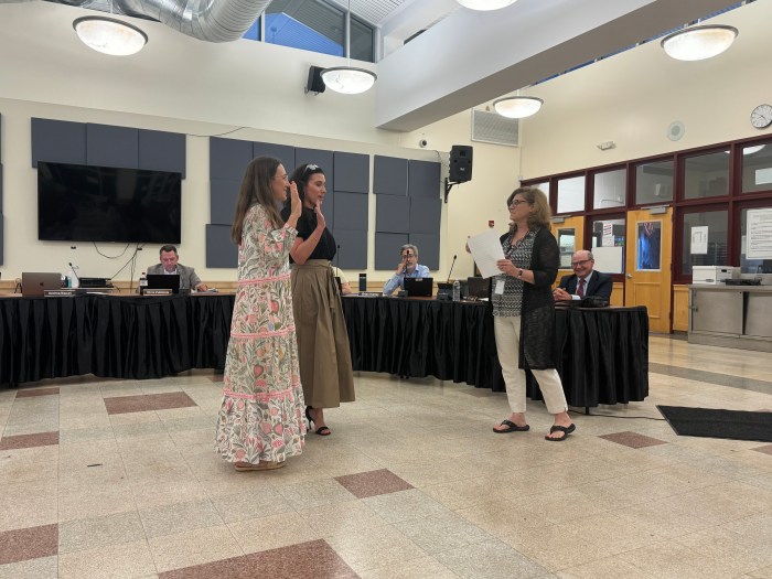 Macari and Colacioppo being sworn in.