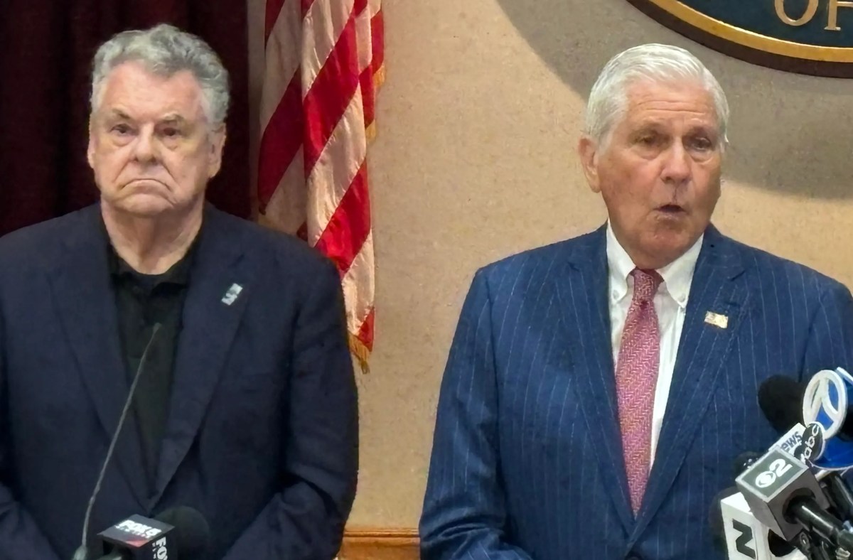 Nassau County Executive Bruce Blakeman (Center), joined by former Rep. Peter King (L.), discusses security for the Cricket World Cup events at Eisenhower Park, which King consulted on.