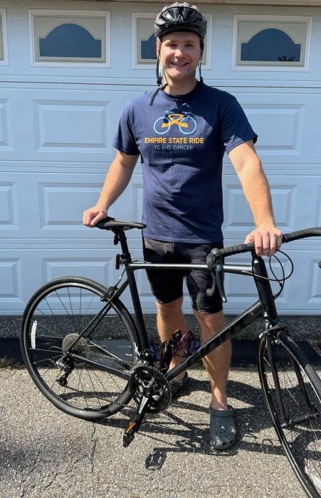 Kane Lewandowski, a former competitive swimmer, is joining Empire State Ride in an effort to end cancer.