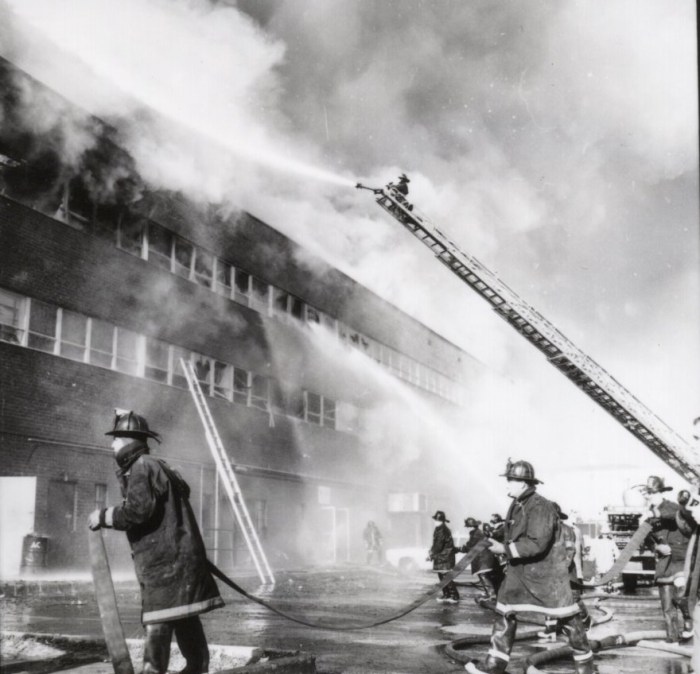 Levittown firefighters putting out a fire at the 3000 building on Hempstead Turnpike.