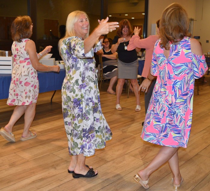 Dinner attendees enjoying Israeli dancing to live music.