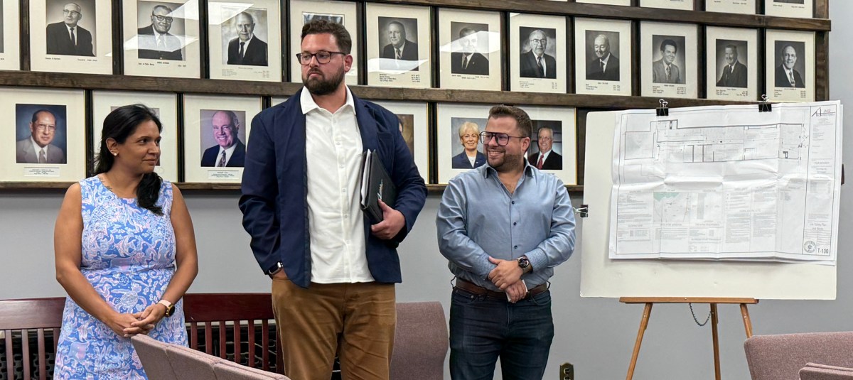The Pour Authority owner, Rita Kumar, and architects Thomas Guarino and Thomas Fox (L. to R.) seeking approval for a new bar at the Farmingdale Village Board of Trustees meeting.