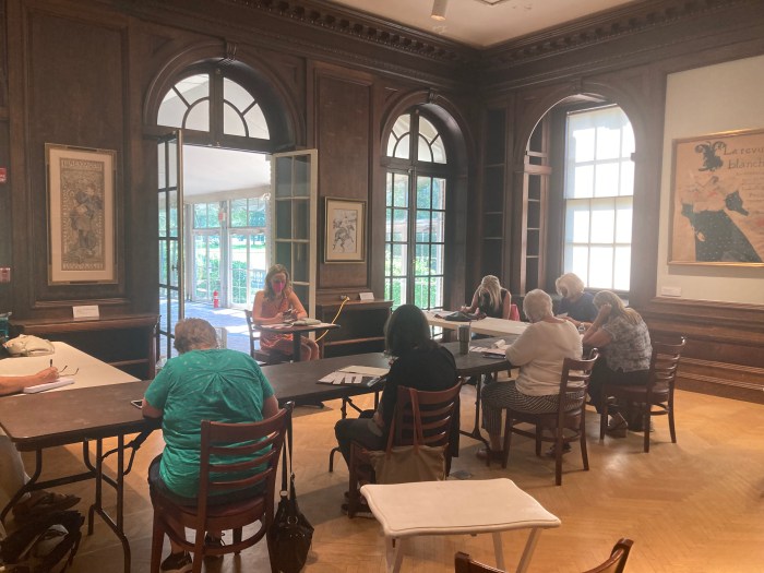 Professor Katie Winkelstein-Douveneck conducting a creative writing class.