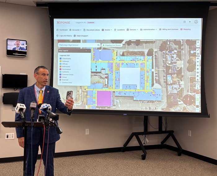 Plainedge Superintendent Edward Salina led a walkthrough at the district's high school to showcase its upgraded technology infrastructure.