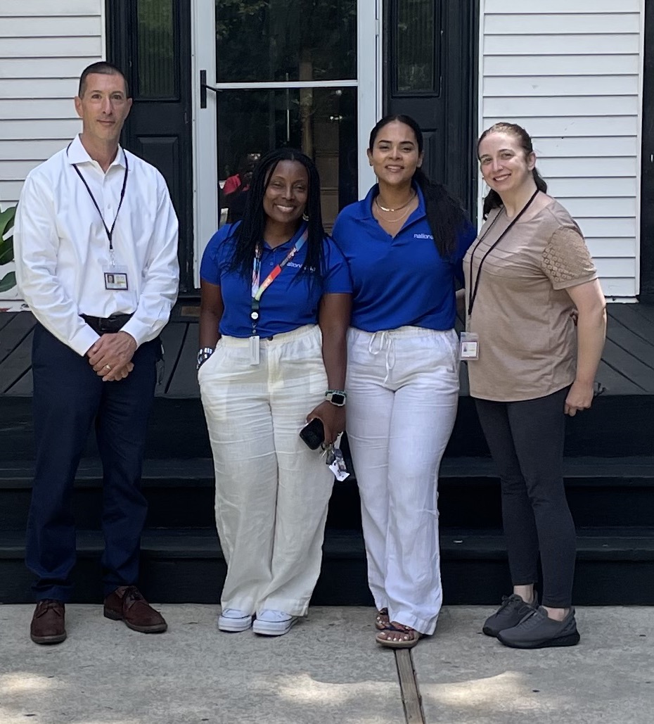 Deputy Executive Director & COO for Hope for Youth Chris Fischer, Community Engagement Coordinator for National Grid, Nelvie Howard, Community Engagement Manager for National Grid Yaryl Gonzalez and Kelly Callahan (L. to R.).