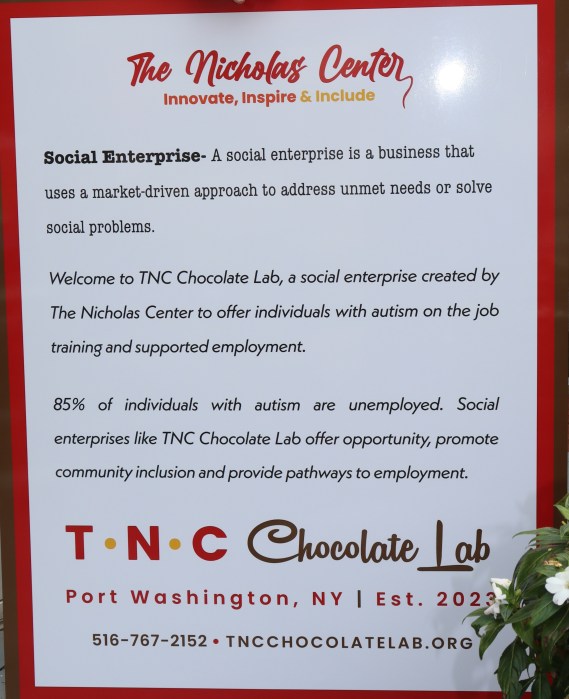 TNC Chocolate Lab welcome sign.