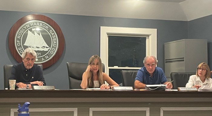 Roslyn Harbor trustees approved a new property enforcement law and discussed firefighter benefit increases during their monthly meeting.