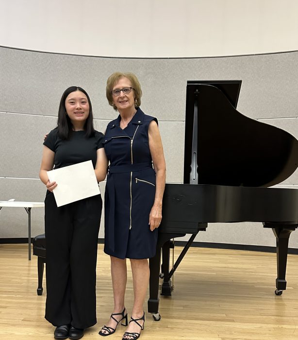 Ruth Pleines (R.) with Weber Middle School student Morgan Sim (L.) who performed at the 2025 Student Recital hosted by the Association of Piano Teachers of Long Island.