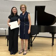 Ruth Pleines (R.) with Weber Middle School student Morgan Sim (L.) who performed at the 2025 Student Recital hosted by the Association of Piano Teachers of Long Island.