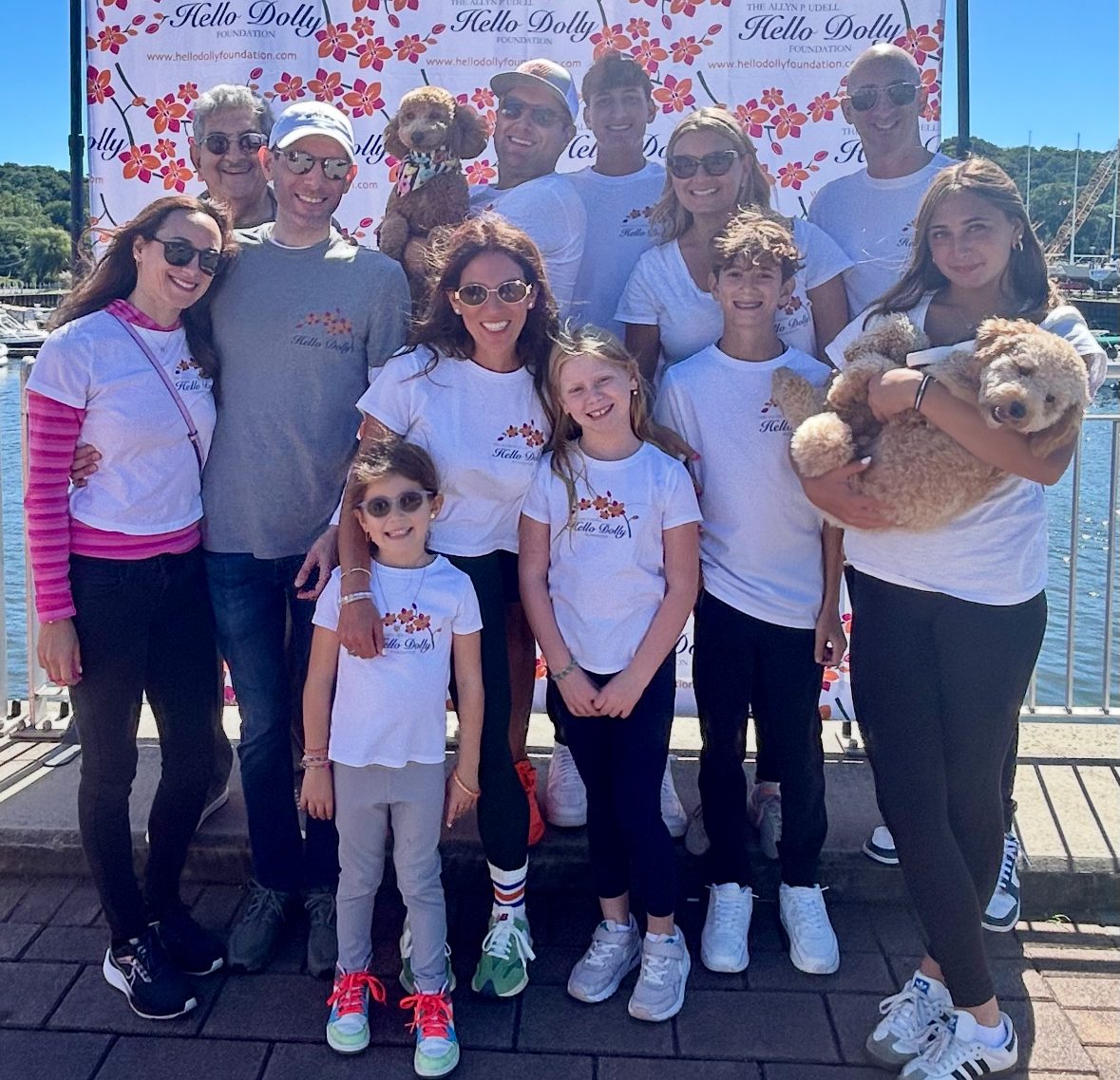 Ira Udell (Top L.) will honor his late wife, Allyn, at the fifth annual Hello Dolly Foundation Walk next month, alongside their children and grandchildren.