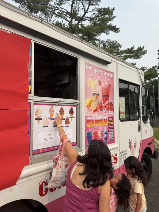 Attendees enjoyed their choice of ice cream at the event.