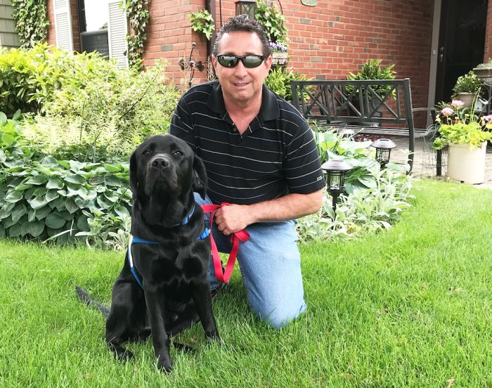 Jim and his black lab, Zach