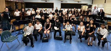 Students in the Levittown Summer Music Program prepared for their performances at Jonas E. Salk Middle School.