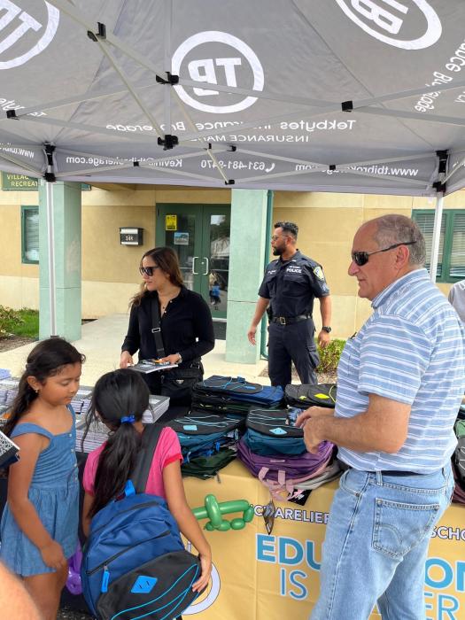 125 backpacks were given out during the Westbury giveaway.