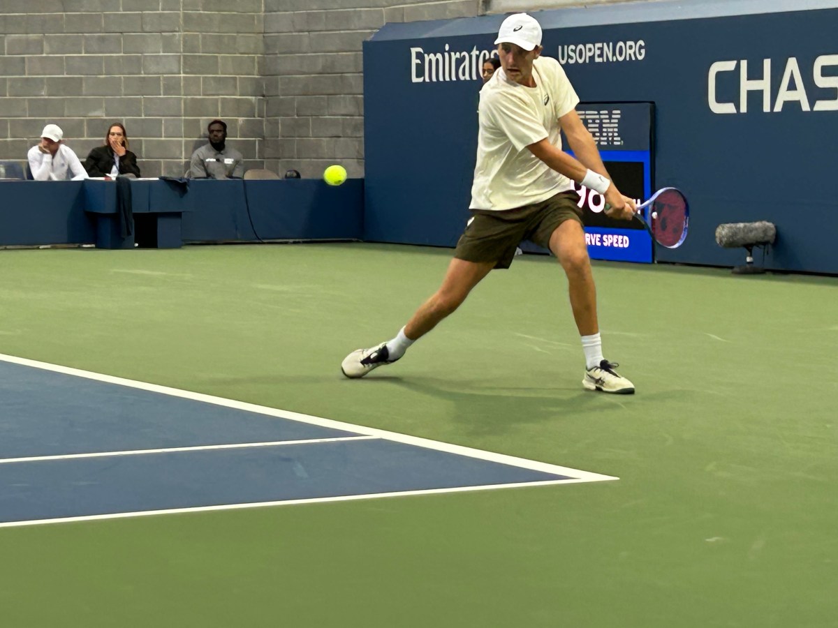 Oyster Bay's Patrick Maloney hits a backhand during Thursday night's U.S. Open qualifying match. Photo credit: Michael J. Lewis