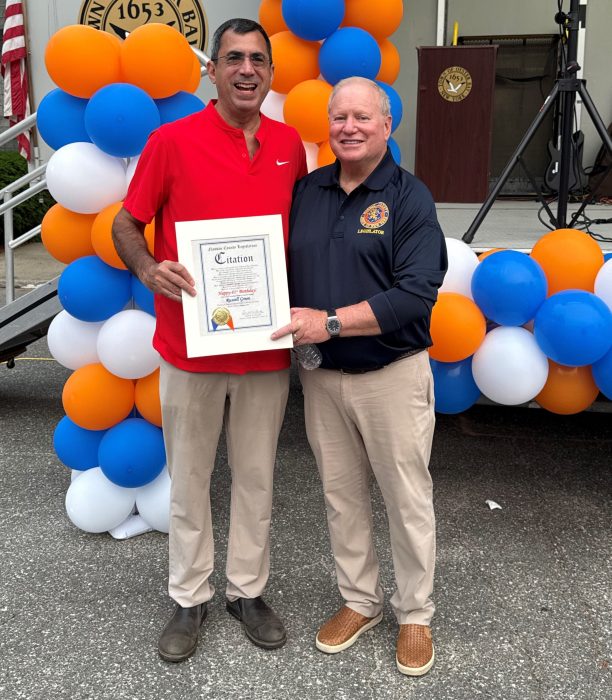 Syosset-Woodbury Chamber of Commerce President Russel Green (L.) and Nassau County Legislature Deputy Minority Leader Arnold Drucker (R.) at National Night Out.