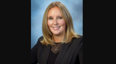 Nassau County Legislature Minority Leader Delia DeRiggi-Whitton announces "promising" test results at Crescent Beach in Glen Cove.