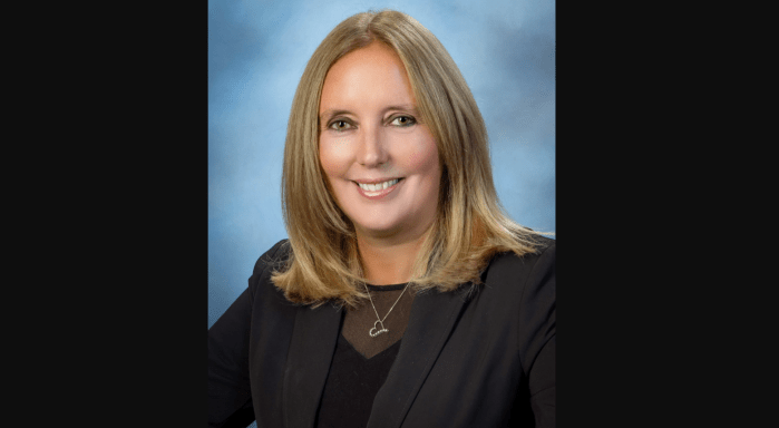 Nassau County Legislature Minority Leader Delia DeRiggi-Whitton announces "promising" test results at Crescent Beach in Glen Cove.