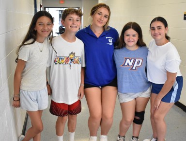 Massapequa Summer Recreation Teen Center counselor Sarah Tamke (C.) with students Giovanna DellaSpelanza, Declan Petrucco, Mia Arnone and Emma Bosman (L. to R.) at the Ames Campus.