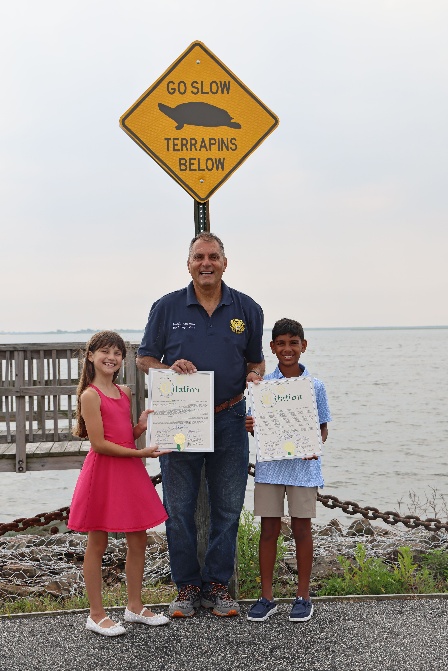Gia Providente, Oyster Bay Town Supervisor Joseph Saladino and Vincent Coolball (L. to R.) after new terrapin turtle signs were installed at two locations.