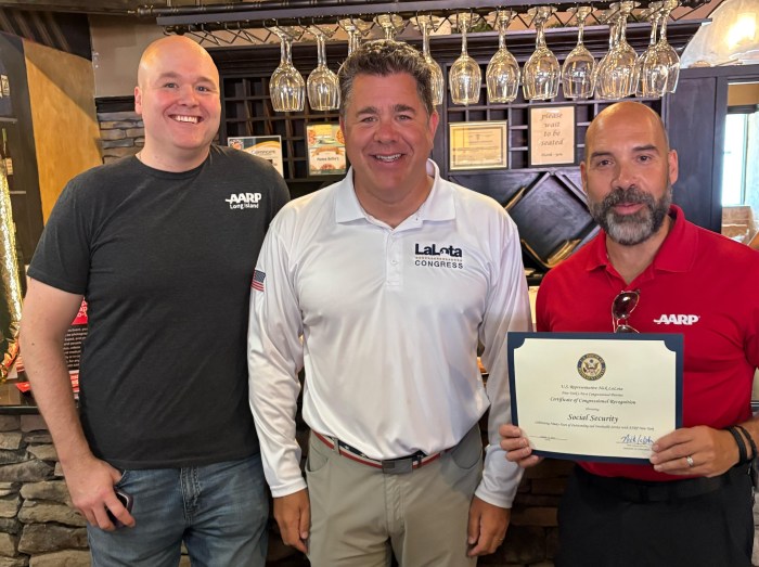 U.S. Rep. Nick Lalota presented AARP New York staff a Certificate of Congressional Recognition honoring Social Security at a Pizza Pop-Up in Medford.