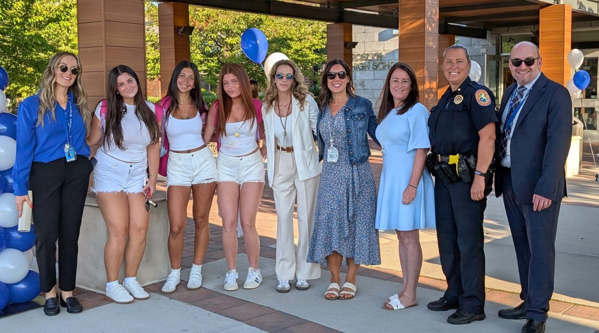 Roslyn High School Assistant Principal Jessica Graf, Superintendent Allison Brown, and Roslyn High School Principal Dave Lazarus with students, staff and local law enforcement.