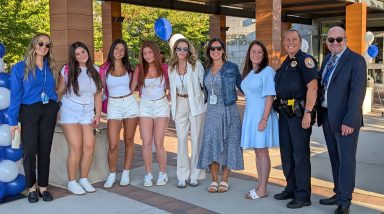 Roslyn High School Assistant Principal Jessica Graf, Superintendent Allison Brown, and Roslyn High School Principal Dave Lazarus with students, staff and local law enforcement.