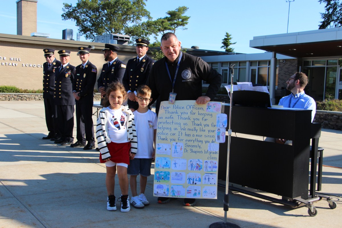Harbor Hill Security Guard Mike Barnwell gets a big thank you from Harbor Hill students on the 24th anniversary of the 9/11 attacks.