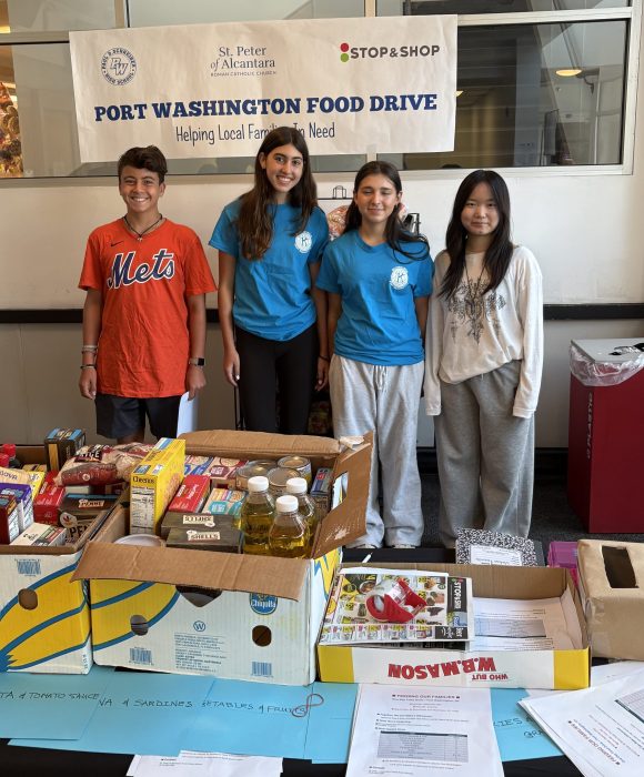Volunteers from Paul D. Schreiber High School's Key Club helped distribute flyers and collect donations for St. Peter of Alcantara's first food drive.