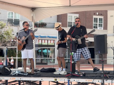 Two local bands performed on the sound stage throughout the day at the Glen Cove Street Fair.