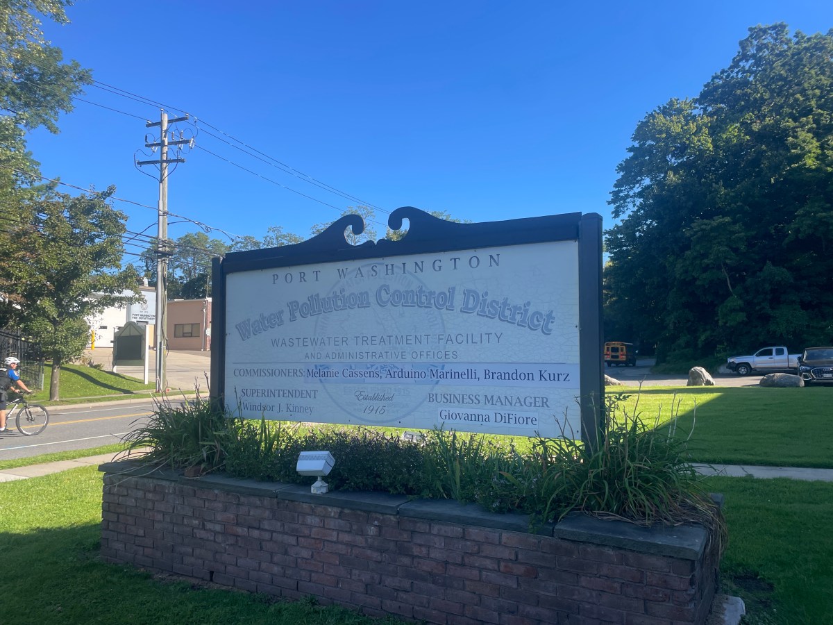 The Port Washington Water Pollution Control District commissioners voted to seek removal of one of the three commissioners.