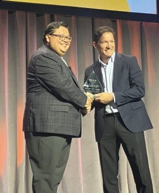 Syosset's John Durante received the John B. Muir Excellence in Media Award from the National Association for College Admission Counseling.