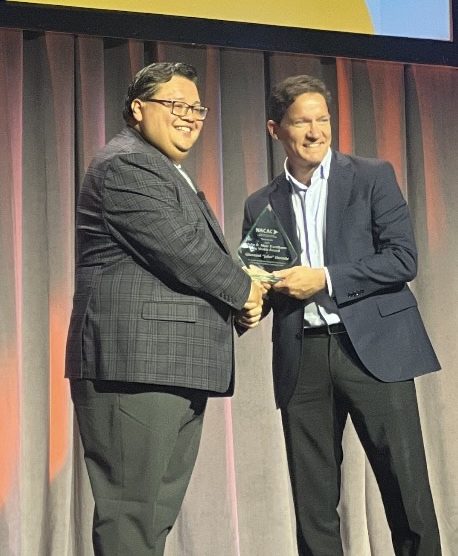 Syosset's John Durante received the John B. Muir Excellence in Media Award from the National Association for College Admission Counseling.