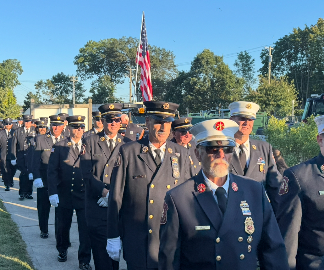 Firefighters from Oyster Bay, East Norwich and surrounding communities stood for the the 9/11 memorial at Theodore Roosevelt Memorial Park.