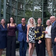 Rosanna Wolff, Beth Horn, Jean Heady, and Howard Kroplick (C. to Far R.) stand in front of the historic trellis at the Metamorphosis Gala.
