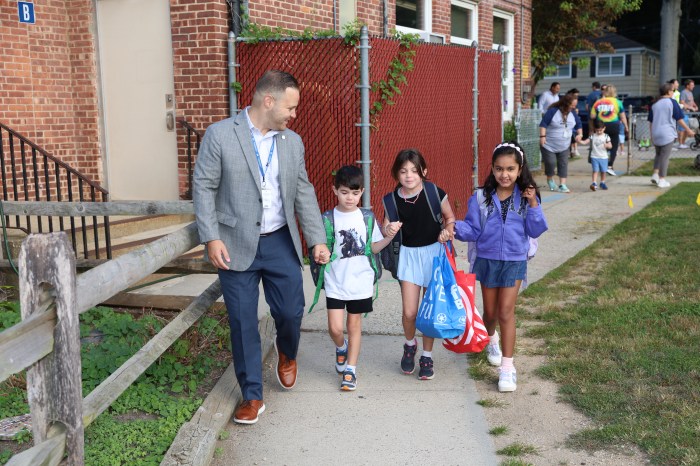 Manorhaven Elementary Principal Eric Mace welcomes students back.