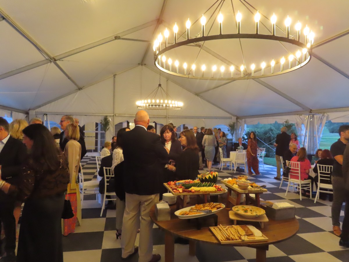 Participants ate dinner, drank cocktails and bid on auction items at the Katie Oppo Research Fund's Night at the Links event.