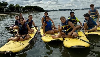 Port Washington Children's Center's Port Day Camp took students on weekly paddleboarding trips throughout the summer.