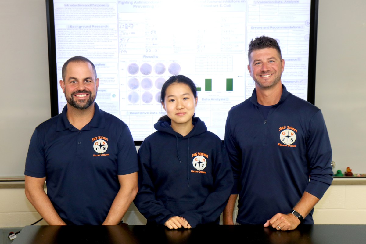 Jada Lin, currently a ninth-grader at South High School, is congratulated by South Middle School science department chair Tobias Hatten (L.) and science teacher/research mentor Brian Pernice (R.) on her recognition among the Top 300 Junior Innovators in the 2025 Thermo Fisher Scientific Junior Innovators Challenge.