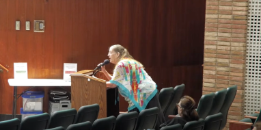 Resident Lisa McLaughlin speaks at the Locust Valley Board of Education meeting regarding the district's policy on transgender students.