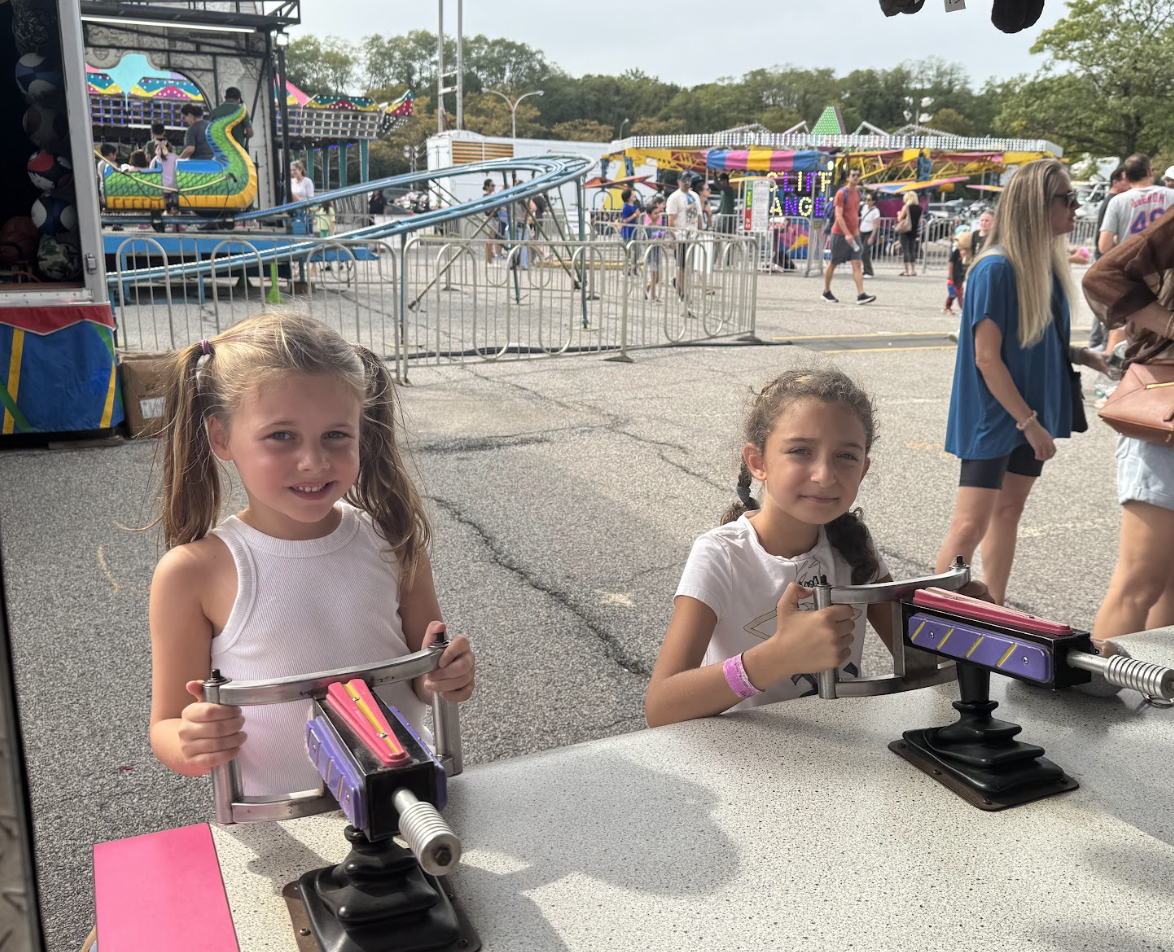 Children competed for prizes at carnival games provided by Newton Shows.