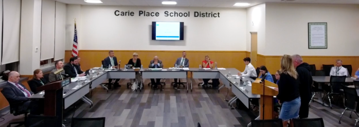 The parents of Ryan Leary questioned the Carle Place School District's decision to prohibit the athlete from playing both football and soccer.