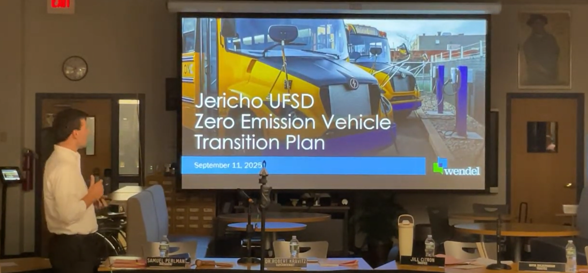 Adam Kaufman, a representative from Wendel Companies spoke at the Jericho Union Free School District Board of Education meeting about the school's plan to shift to electric buses.