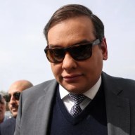 Ex-Rep. George Santos says he was placed in a high-security prison unit at FCI Fairton after warnings of a possible death threat.