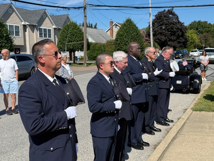 Carle Place service members honored those who died during the ceremony.