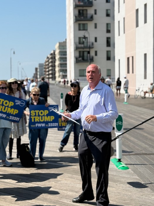 Eric Weltman led the protest in Long Beach.