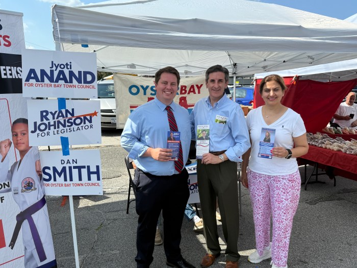Democrats Ryan Johnson, Wayne Wink and Jyoti Anand (L. to R.) at the Hicksville street fair.