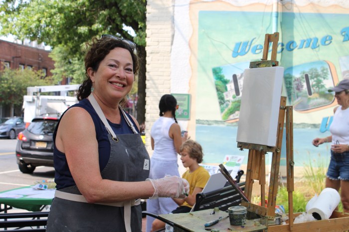 Visual Artist Rachelle Krieger painted live during the event.