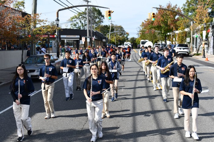 The marching band led the homecoming parade.