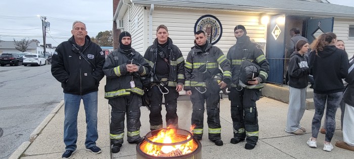 The event retired damaged or worn flags by burning them.